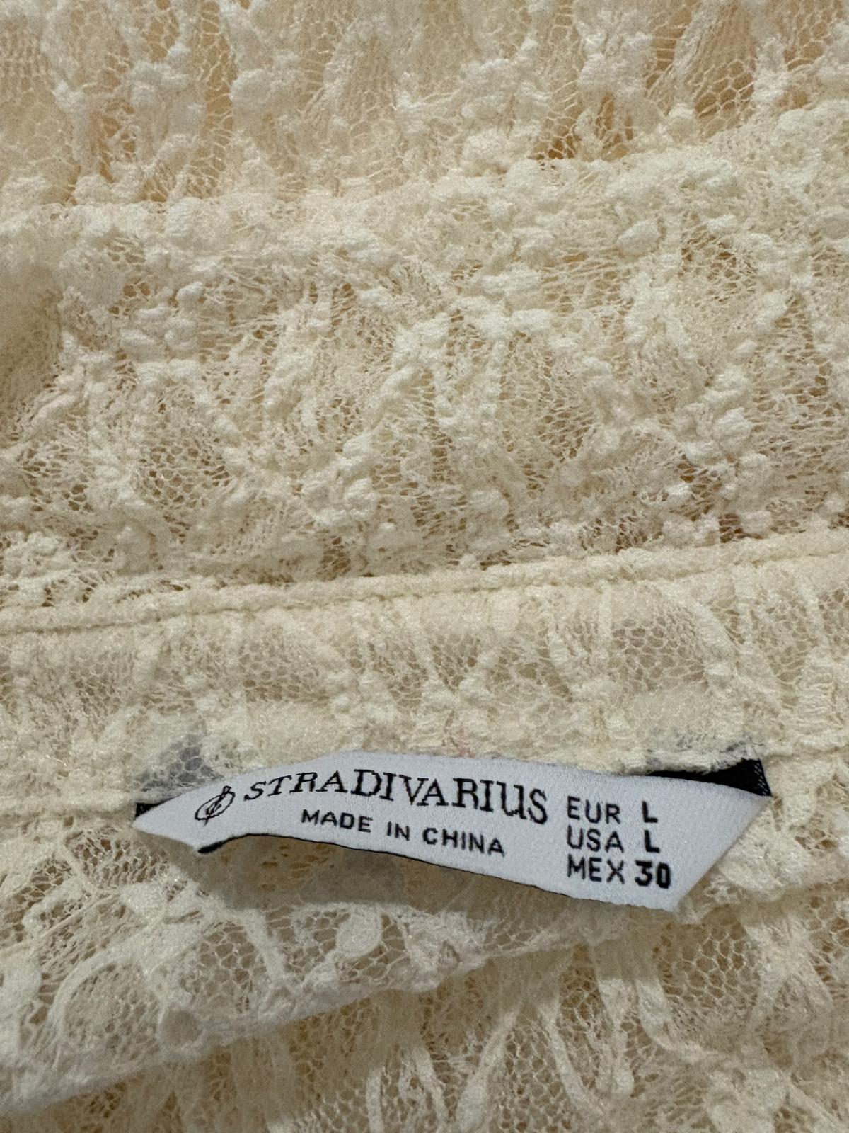 VESTIDO CON TRANSPARENCIA STRADIVARIUS