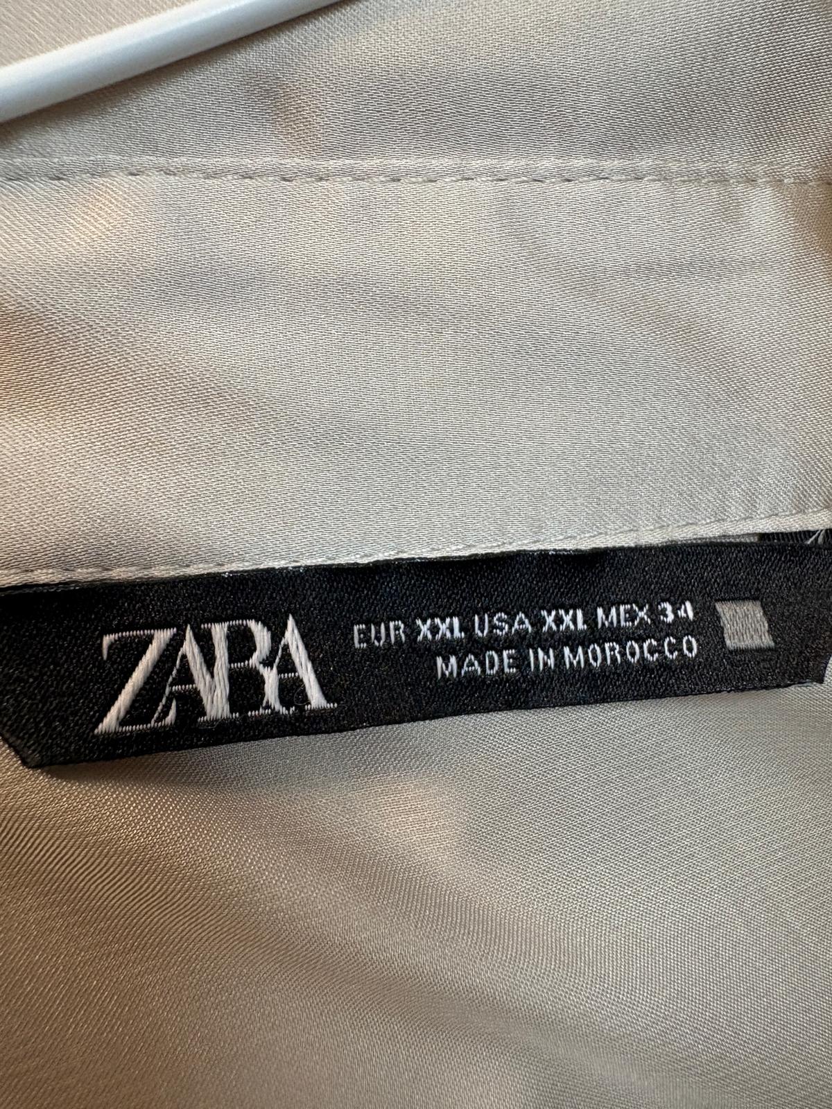 BLUSA COLOR HUESO ZARA